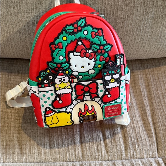 Sanrio Festive Red Backpack with Holiday Characters gently used Apx 11 By 8